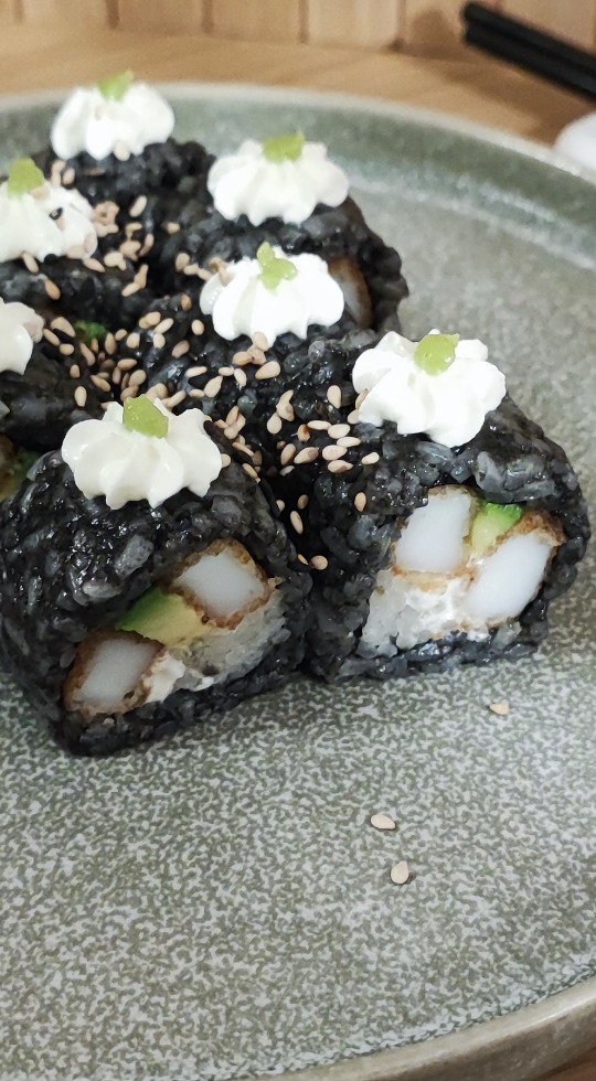 This week's premium offering: black rice sushi with squid ink, squid, wasabi, and cream cheese.